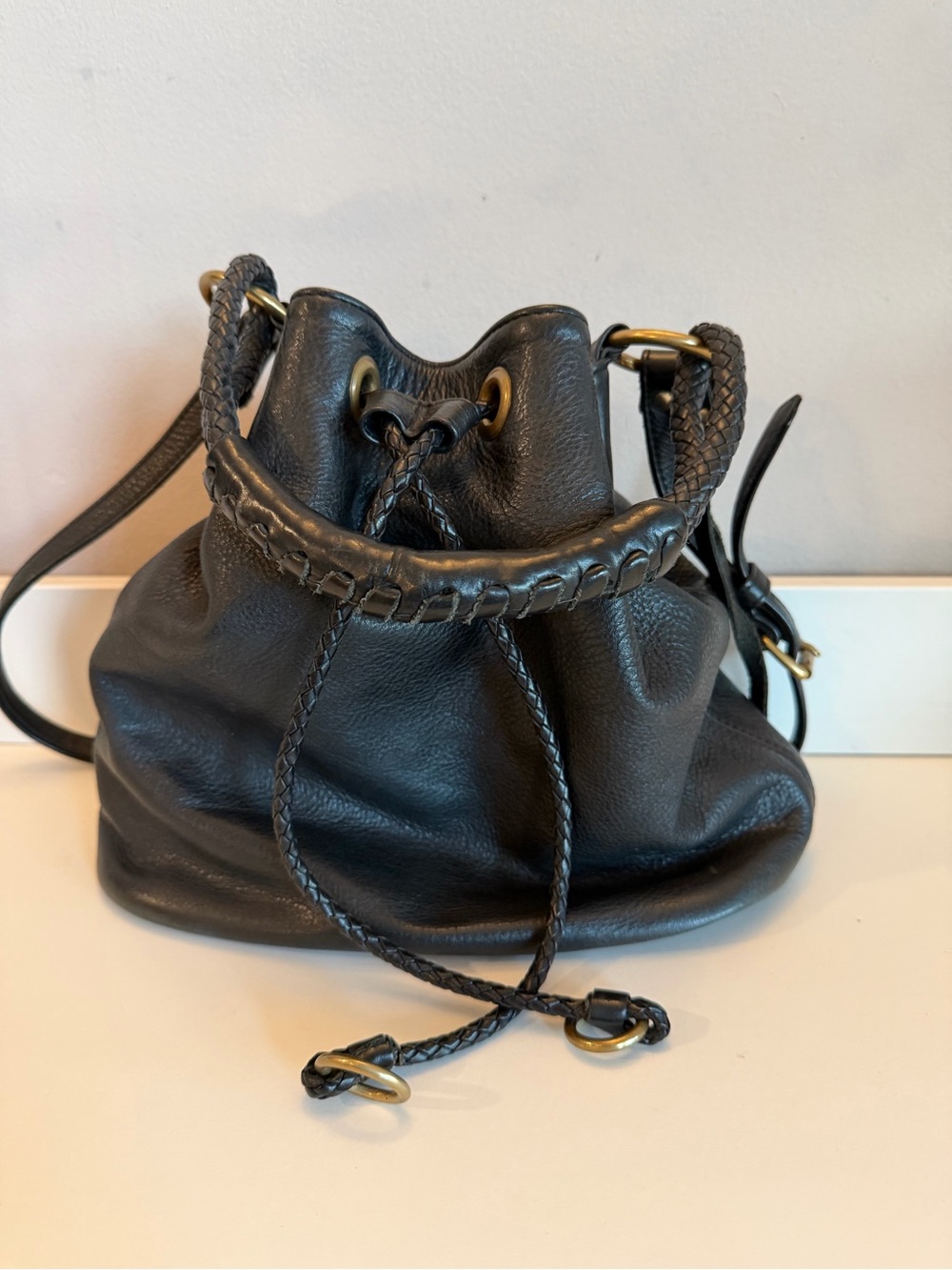 Henri Lou Black Pebbled Leather Drawstring Bucket Bag Braided Trim Brass